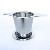 Theefilter met onderzetter Theefilter met onderzetter